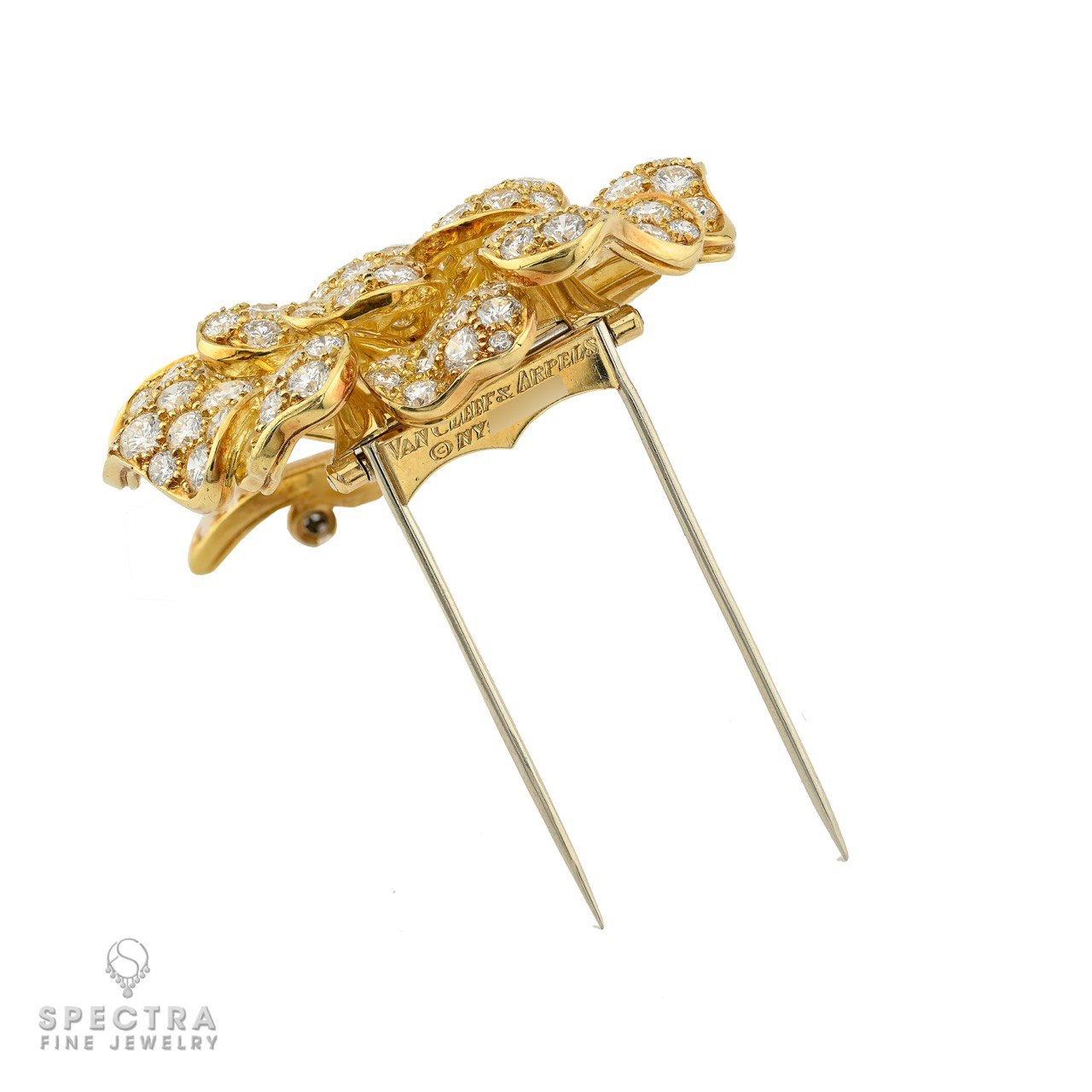 Van Cleef & Arpels brooch showing signature and NY mark on the back